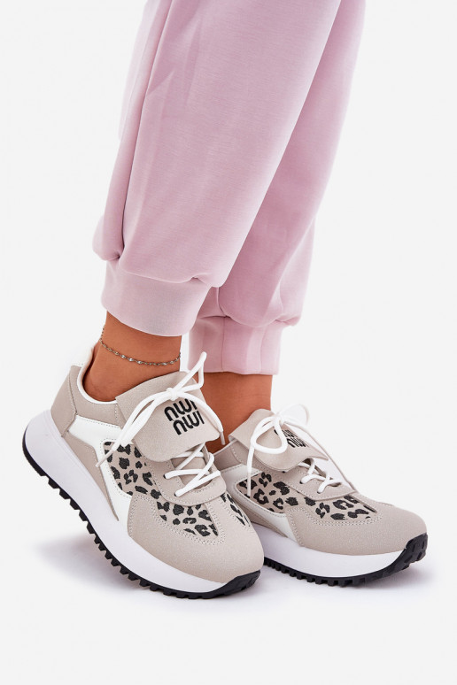 tênis À modalo de tênis Feminino com uma plataforma com padrões de pele de leopardo Branco-bege Pumbes tênis À modalo de tênis Feminino com uma plataforma com padrões de pele de leopardo Branco-bege Pumbes