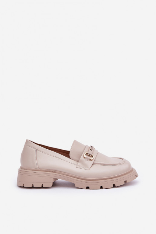 Mocassins femininos em tom areia de... Mocassins femininos em tom areia de...