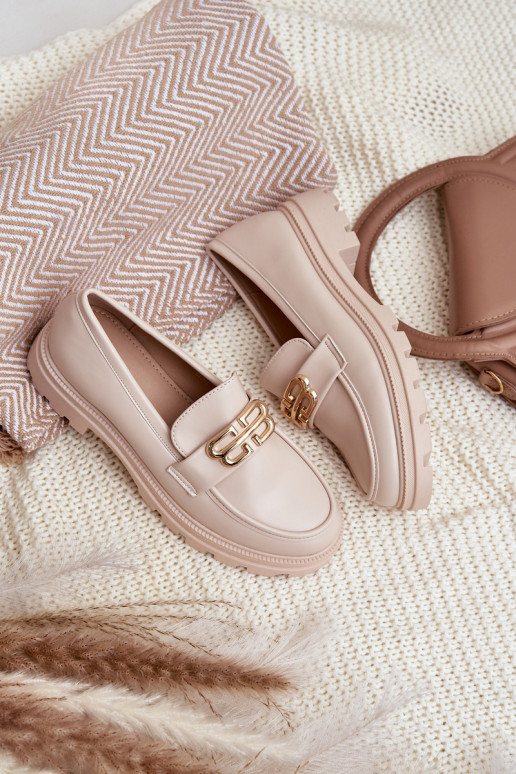 Mocassins femininos em tom areia de... Mocassins femininos em tom areia de...