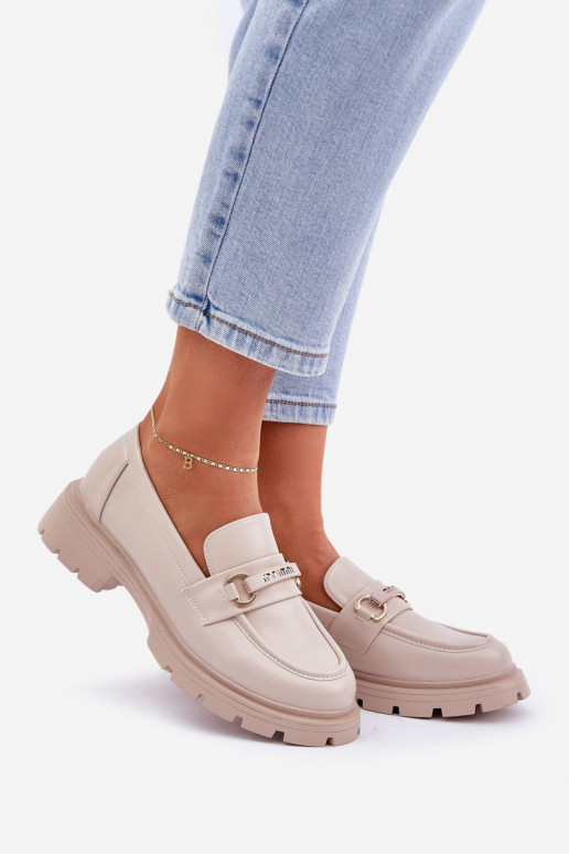 Mocassins femininos em tom areia de... Mocassins femininos em tom areia de...