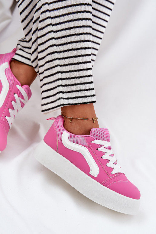 À modalo de tênis Feminino com uma plataforma cor rosa Tellnira