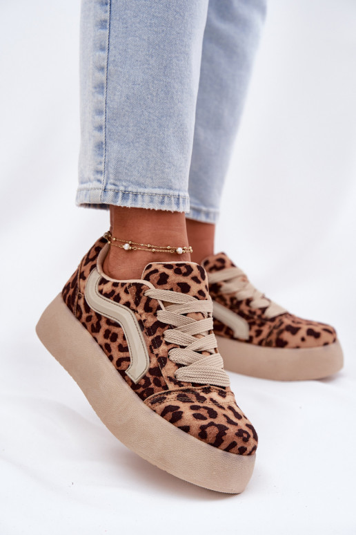 À modalo de tênis Feminino com uma plataforma com padrões de pele de leopardo Tellnira À modalo de tênis Feminino com uma plataforma com padrões de pele de leopardo Tellnira