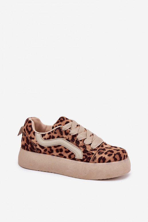 À modalo de tênis Feminino com uma plataforma com padrões de pele de leopardo Tellnira À modalo de tênis Feminino com uma plataforma com padrões de pele de leopardo Tellnira