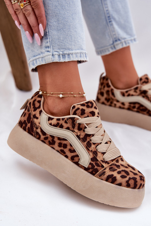 À modalo de tênis Feminino com uma plataforma com padrões de pele de leopardo Tellnira À modalo de tênis Feminino com uma plataforma com padrões de pele de leopardo Tellnira