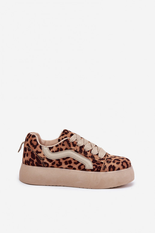 À modalo de tênis Feminino com uma plataforma com padrões de pele de leopardo Tellnira À modalo de tênis Feminino com uma plataforma com padrões de pele de leopardo Tellnira