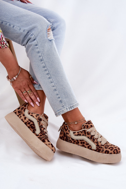 À modalo de tênis Feminino com uma plataforma com padrões de pele de leopardo Tellnira À modalo de tênis Feminino com uma plataforma com padrões de pele de leopardo Tellnira