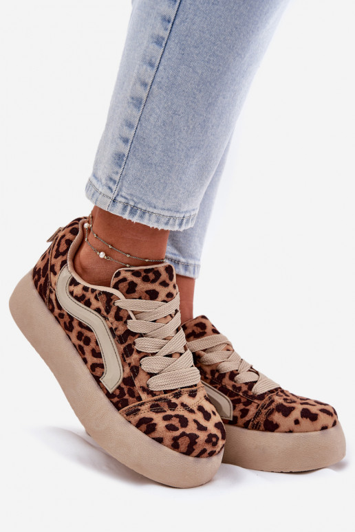 À modalo de tênis Feminino com uma plataforma com padrões de pele de leopardo Tellnira À modalo de tênis Feminino com uma plataforma com padrões de pele de leopardo Tellnira