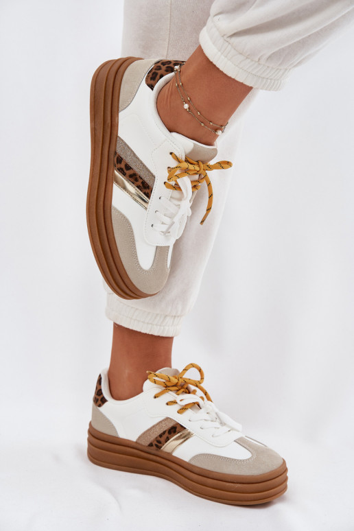 À modalo de tênis Feminino com uma plataforma Z PodParaójnym Amarrandom com padrões de pele de leopardo cor branca Niteria À modalo de tênis Feminino com uma plataforma Z PodParaójnym Amarrandom com padrões de pele de leopardo cor branca Niteria