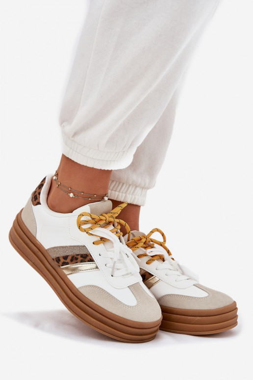 À modalo de tênis Feminino com uma plataforma Z PodParaójnym Amarrandom com padrões de pele de leopardo cor branca Niteria À modalo de tênis Feminino com uma plataforma Z PodParaójnym Amarrandom com padrões de pele de leopardo cor branca Niteria