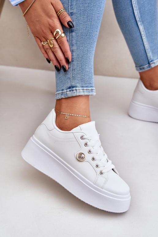 Eko Pele À modalo de tênis com uma plataforma Ze cor douradam Detalem cor branca Zingie Eko Pele À modalo de tênis com uma plataforma Ze cor douradam Detalem cor branca Zingie