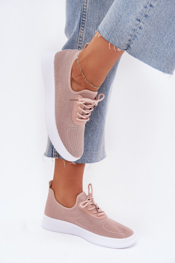 Um modelo atraente tênis com uma plataforma Feminino cor rosa Kalyra