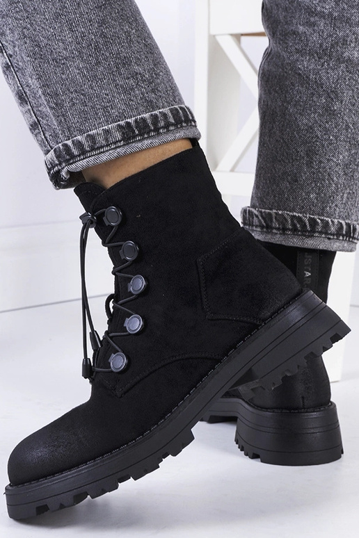 Botas pretas de camurça sintética...