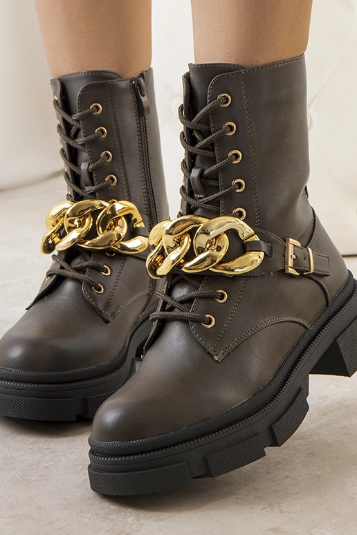 Botas de caminhada com corrente verde...