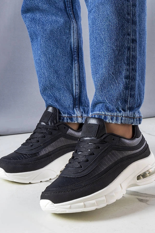 Tênis pretos da Courtne