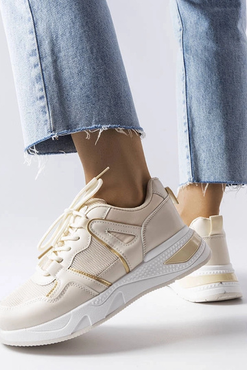 Tênis bege de material... 2