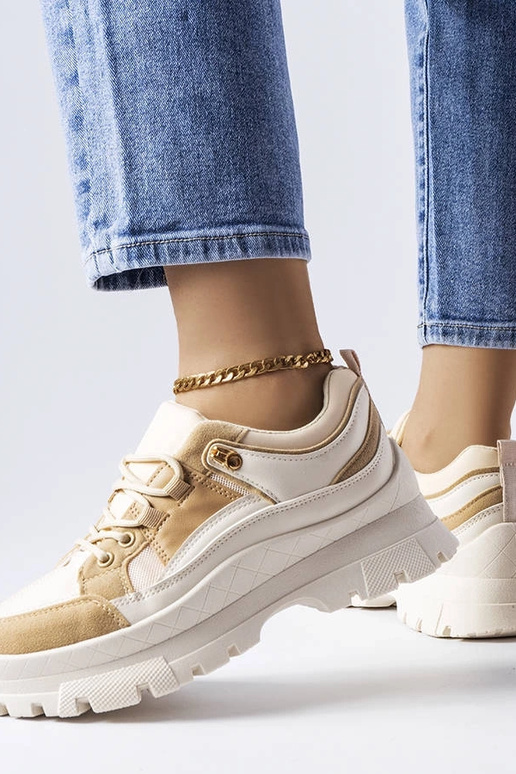 Tênis esportivos marrons com sola...