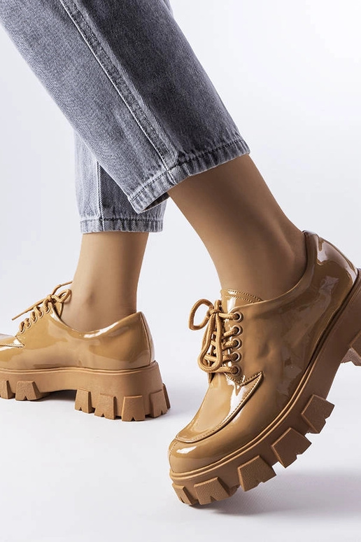 Botas de cano curto marrons...