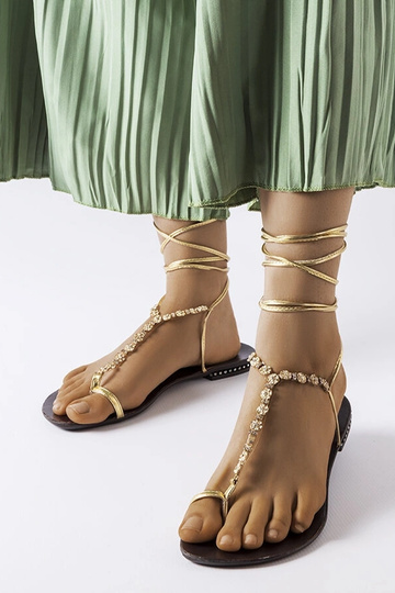 Sandálias Troghi douradas...