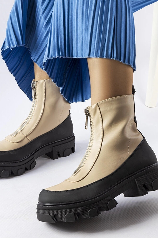 Botins femininos bege com sola grossa...