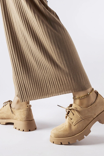 Mocassins marrons com sola... 2