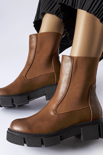 Botas de cano alto de salto...