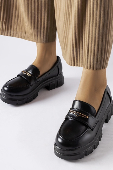 Mocassins pretos com solado visível Fuori