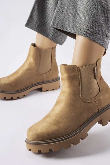 Botins de inverno em areia,...