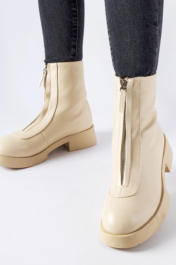 Botins isolados bege com fecho Baldo