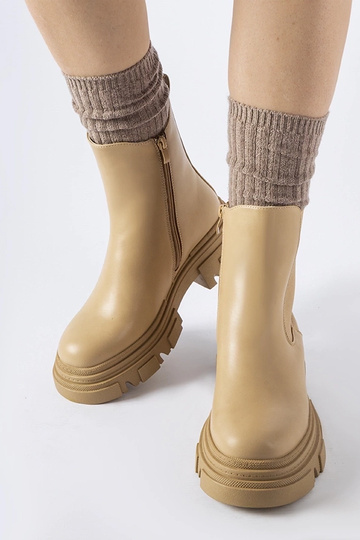 Botins bege com aplicação de borracha D'Isola