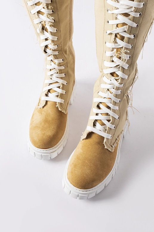 Botas altas de inverno em tecido em...