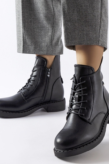 Botas rasas assimétricas...