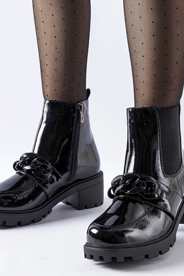 Botas isolantes pretas de couro envernizado com fivela Leo