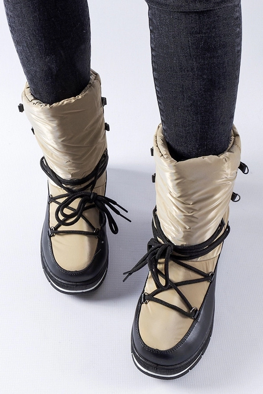 Botas de neve com plataforma bege...