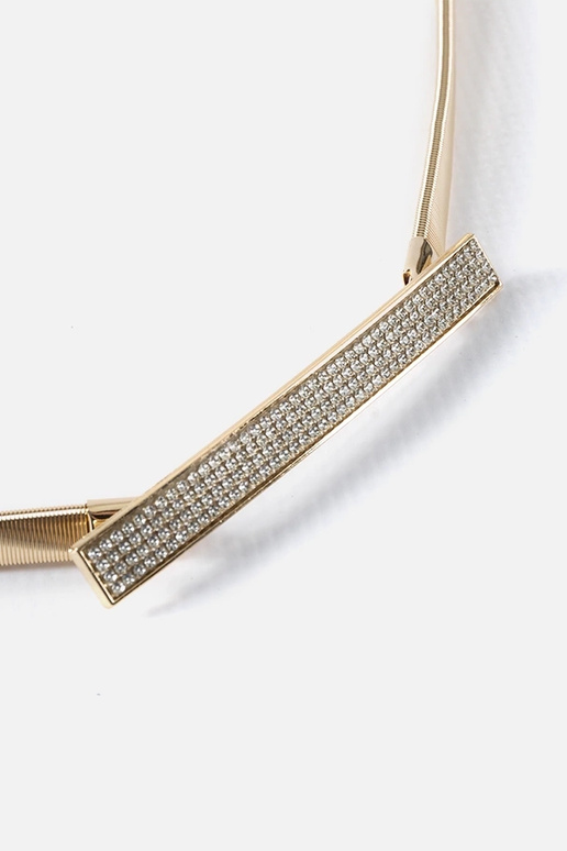 Pulseira elástica dourada com zircões...