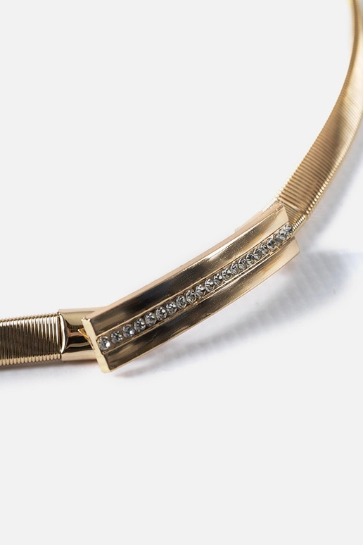 Pulseira elástica dourada com zircões...