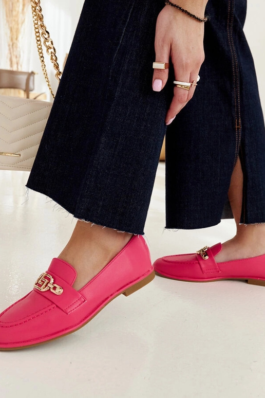 Mocassins rosa decorados com uma...