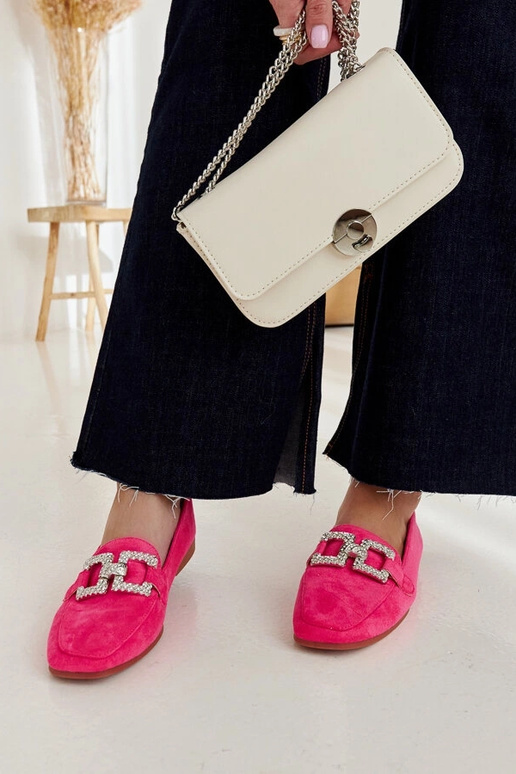 Mocassins rosa decorados com uma...