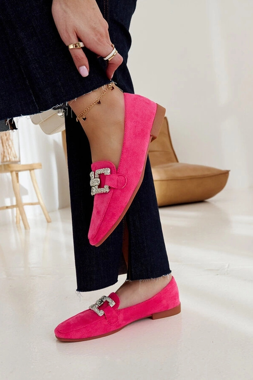 Mocassins rosa decorados com uma...