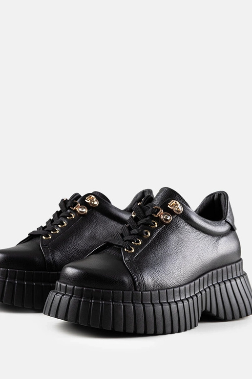 Ténis negros de couro com plataforma...