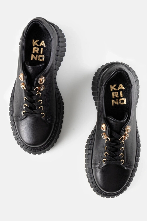 Ténis negros de couro com plataforma...