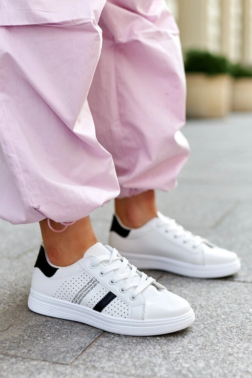 Tênis Berdine preto e branco em couro...