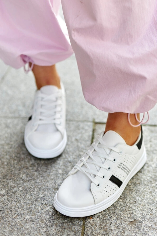 Tênis Berdine preto e branco em couro...