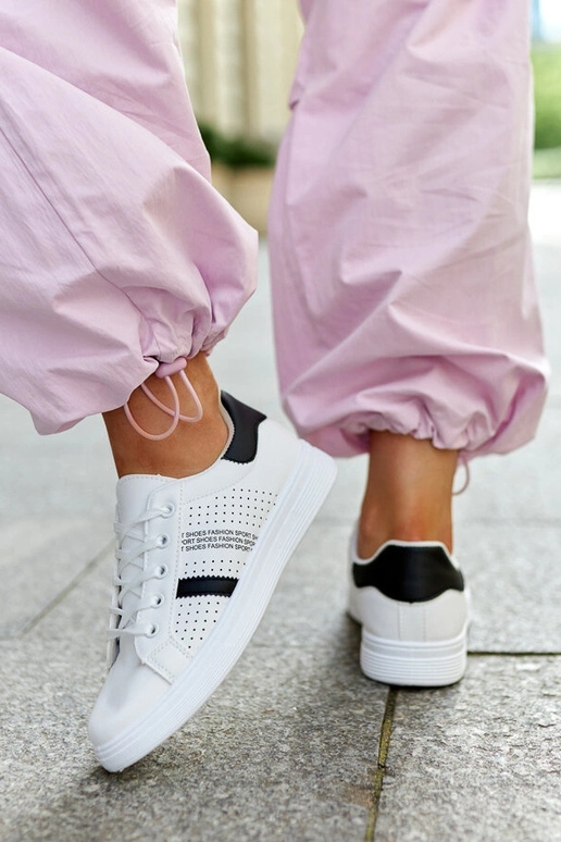 Tênis Berdine preto e branco em couro...