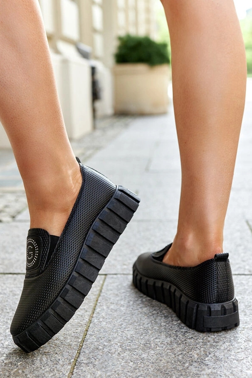 Botas pretas de cano curto com sola...