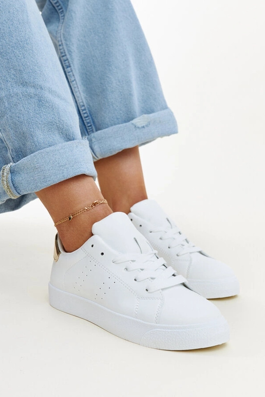 Tênis Akila branco e dourado