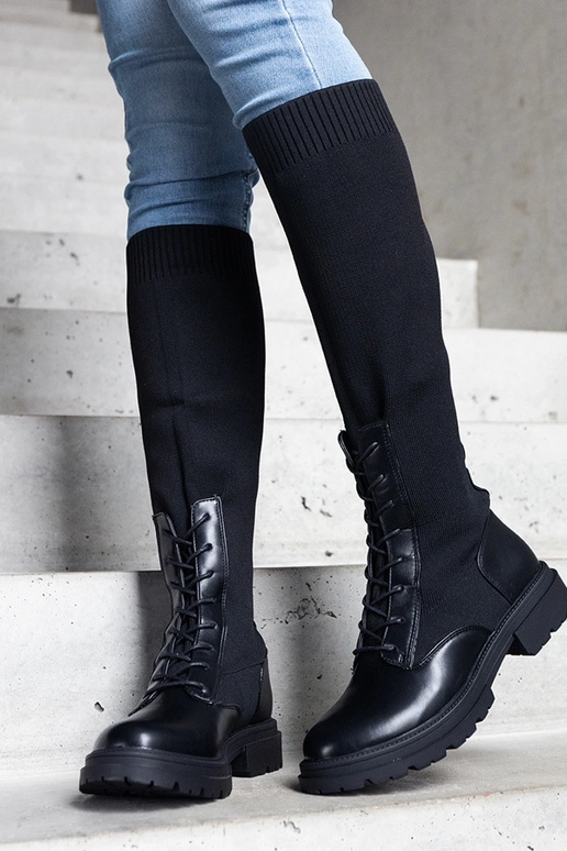 Botas pretas slip-on com cabedal em...