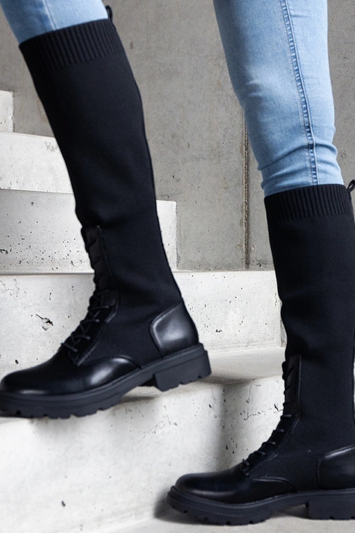 Botas pretas slip-on com cabedal em...