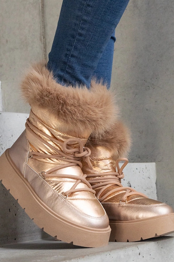 Botas de neve isoladas bege... 2