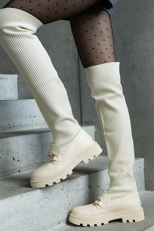 Botas bege claro com cano elástico e...