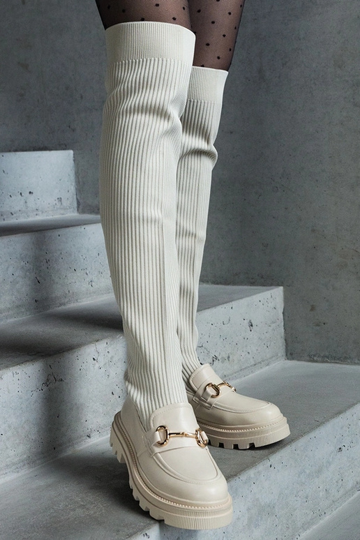 Botas bege claro com cano elástico e...